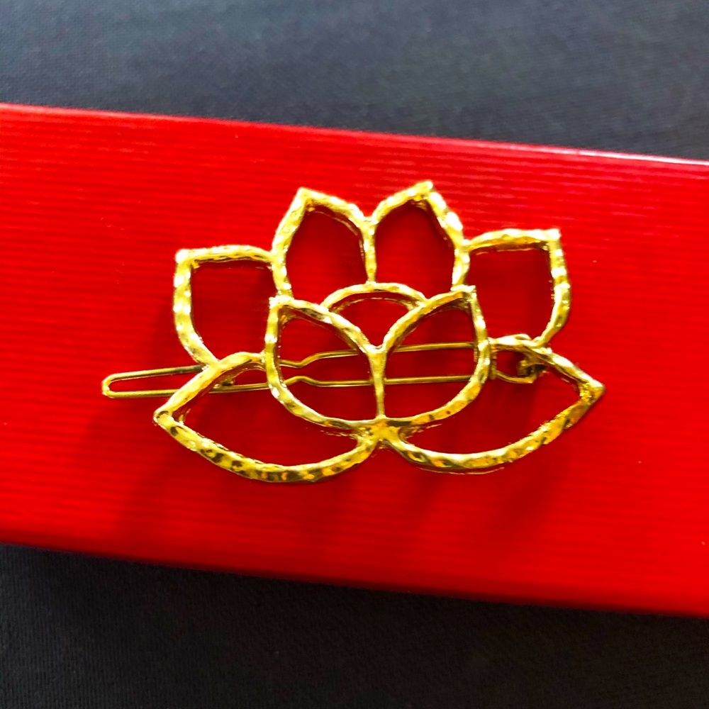 Gold-Tone Barrette.